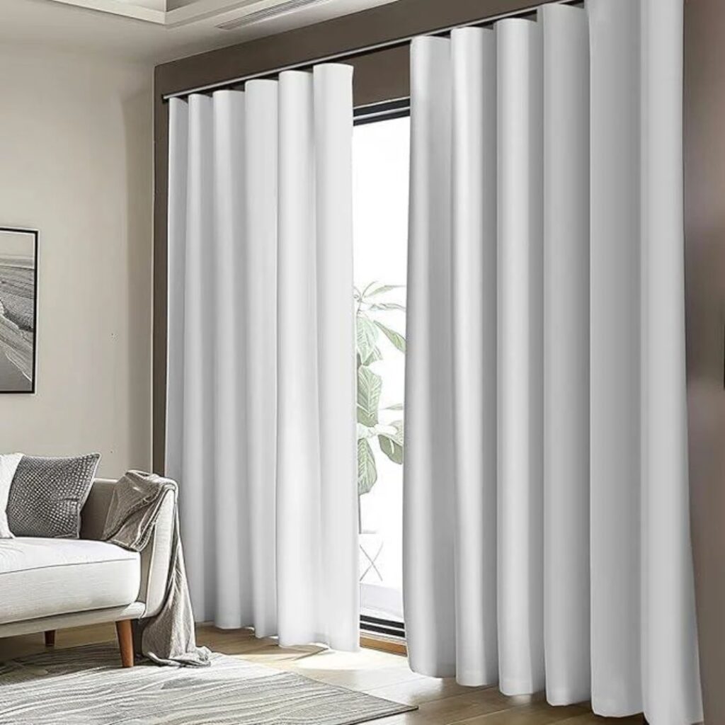white blackout curtains with black rods in Abu Dhabi